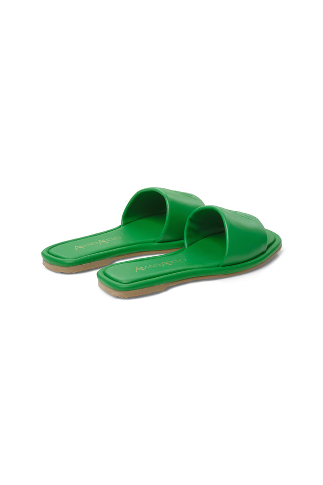 back side view of womens leather green slide